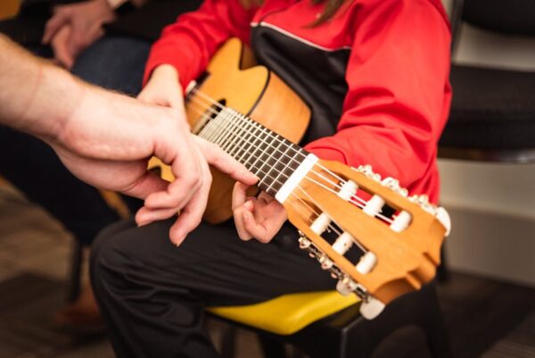 Unlock Your Musical Potential with Guitar Lessons